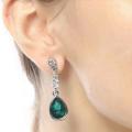 Parure bijoux métal rhodié argenté et cristaux vert émeraude